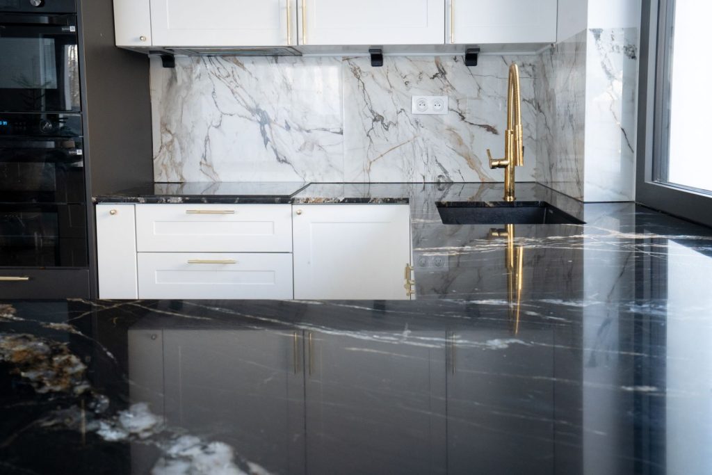 After a professional granite repair, a polished kitchen countertop